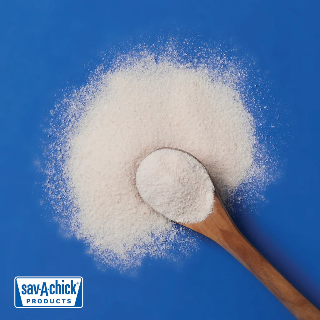 Sav-A-Chick electrolyte powder on a wooden spoon