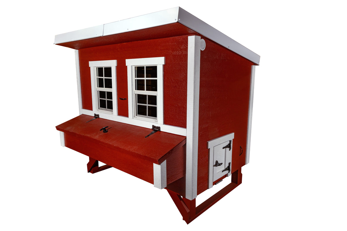 Blue large chicken coop with white trim, angled view with nesting boxes