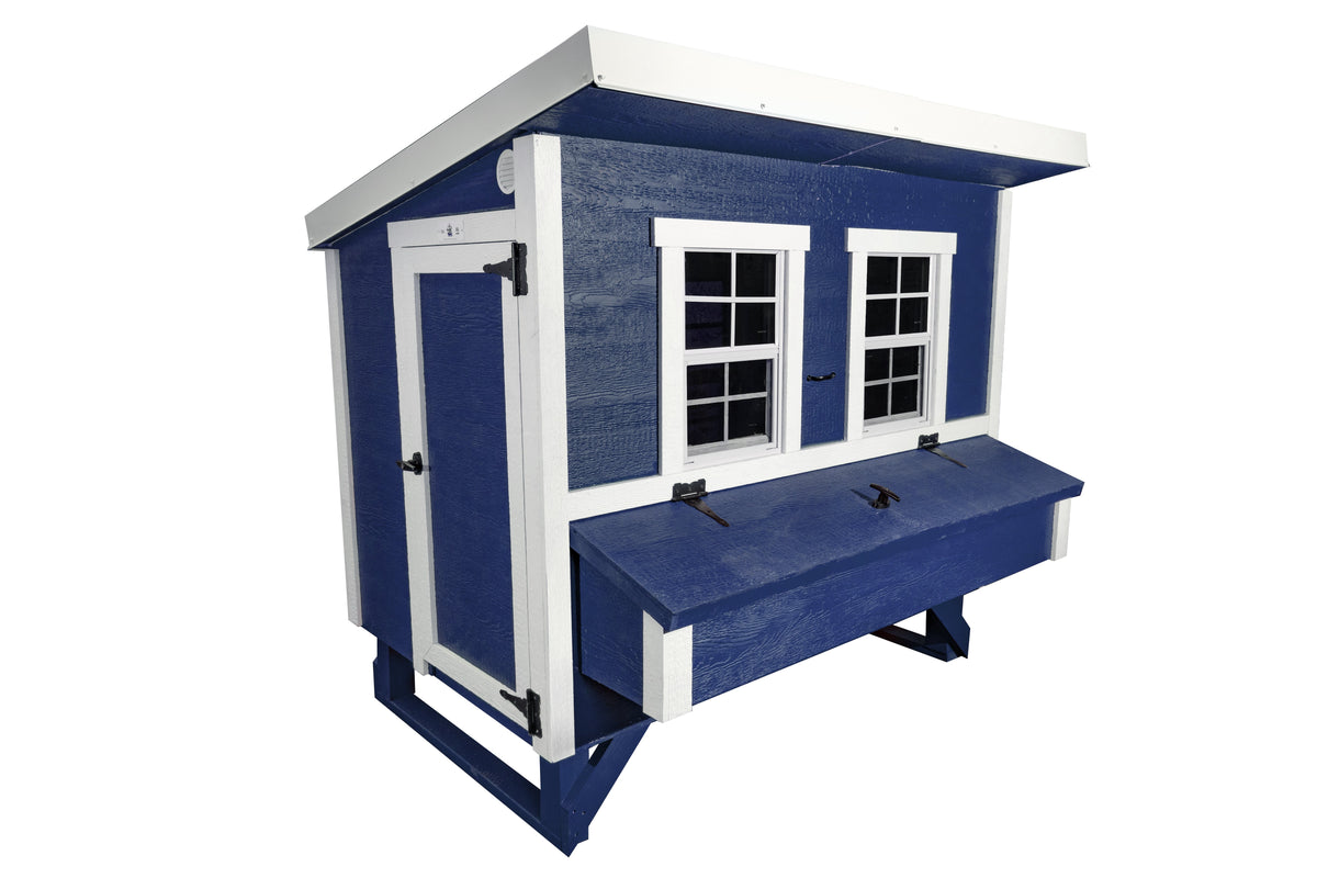 Blue large chicken coop with white trim, angled view with nesting boxes