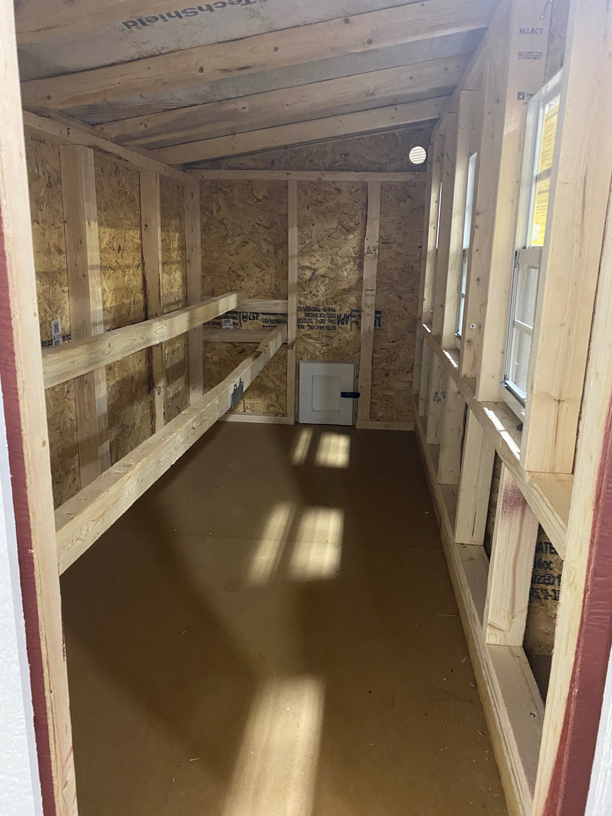 Interior of the XL chicken coop with roosting space