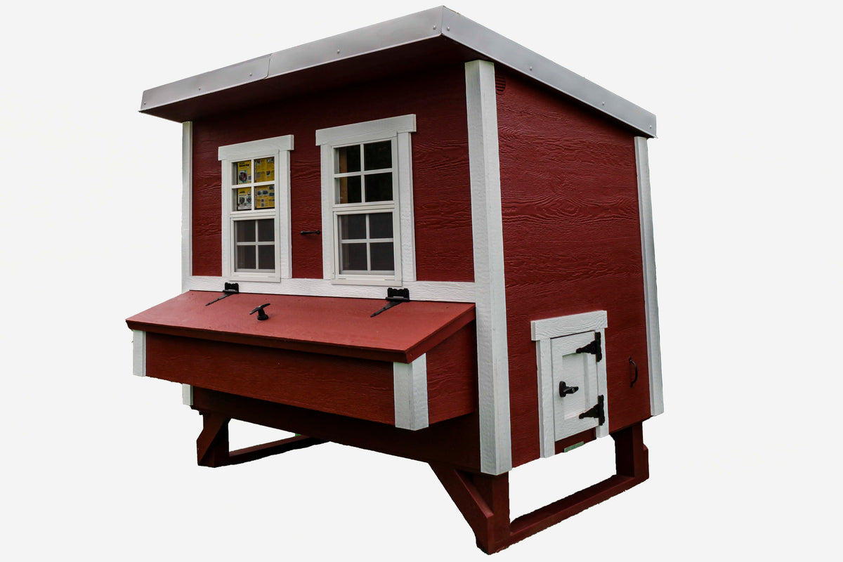 Red large chicken coop with white trim, side view with external nesting box
